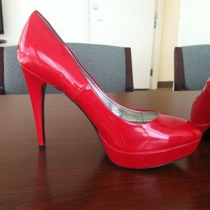 Guess Red patent leather Hortons platform shoes. Barley worn in good condition.